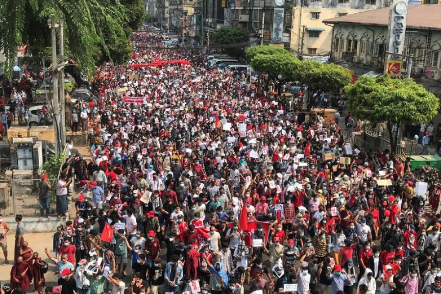 People rally in a protest against the military coup and to demand the release of elected leader Aung San Suu Kyi, in Yangon, Myanmar, February 07, 2021 — Reuters/Files