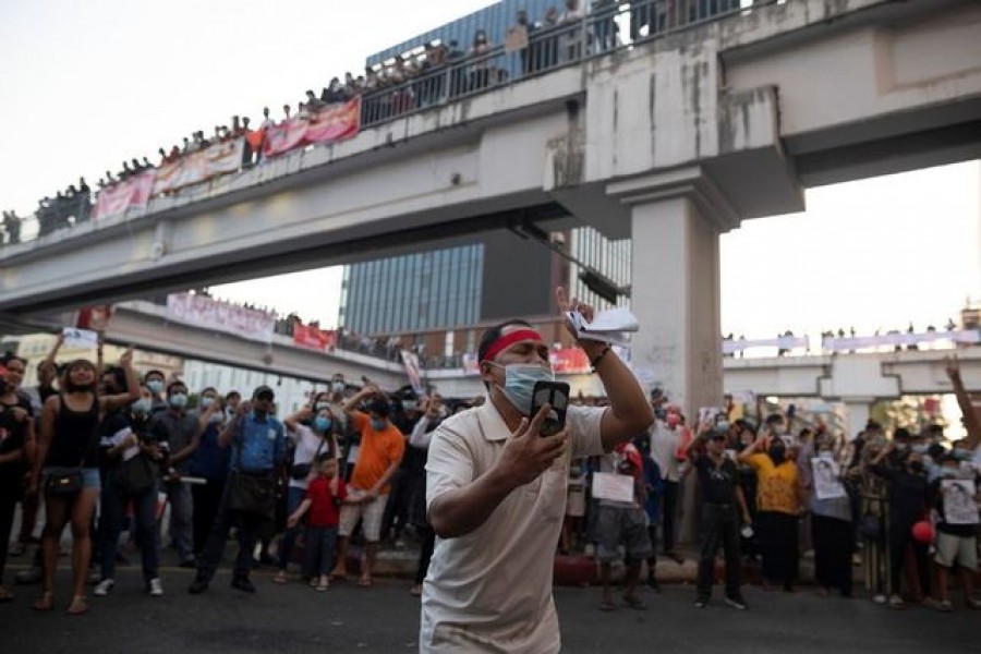 People join a rally against the military coup and to demand the release of elected leader Aung San Suu Kyi, in Yangon, Myanmar, February 8, 2021. REUTERS/Stringer