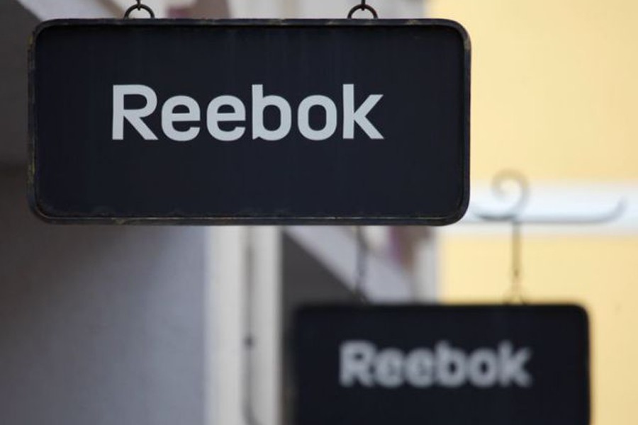 Boards with Reebok store logo are seen on a shopping center at the outlet village Belaya Dacha outside Moscow, Russia on April 23, 2016 — Reuters/Files