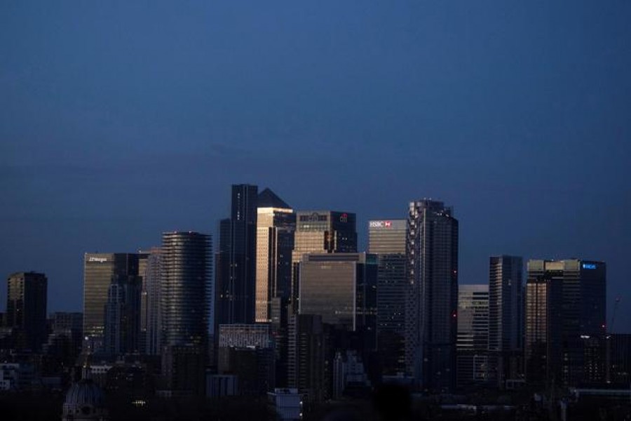 FILE PHOTO: Canary Wharf stands in London, Britain December 27, 2020. REUTERS/Simon Dawson/File Photo