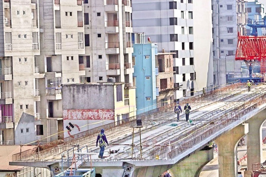 Metro rail line between Dhaka's Uttara and Agargaon visible