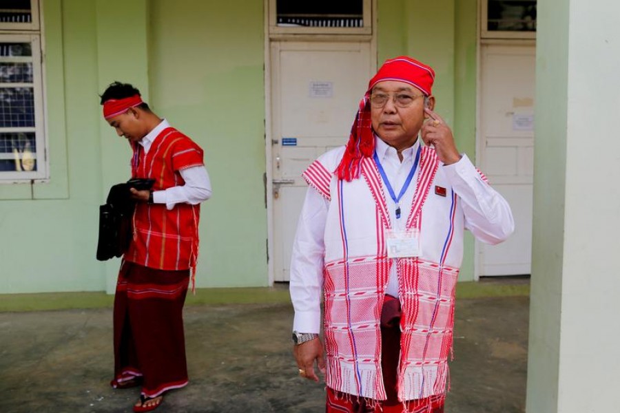 FILE PHOTO: Mahn Win Khaing Than new speaker of Upper House of Parliament leaves his room for the opening of the new upper house of parliament in Naypyitaw February 3, 2016. REUTERS/Soe Zeya Tun