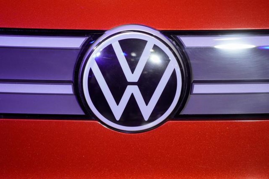 FILE PHOTO: A Volkswagen logo is seen at a construction completion event of SAIC Volkswagen MEB electric vehicle plant in Shanghai, China November 8, 2019. REUTERS/Aly Song