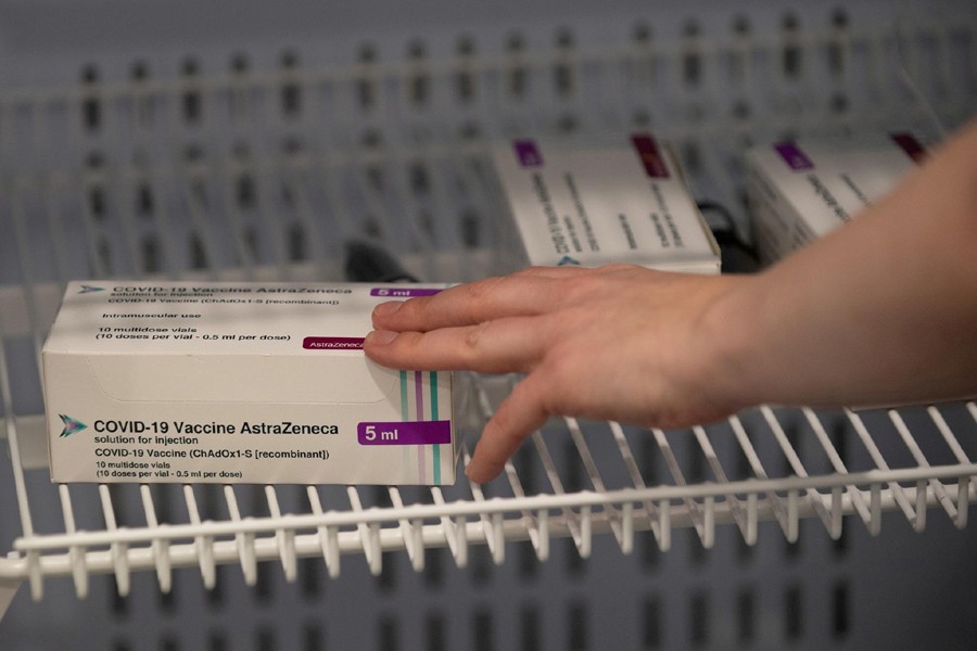 Boxes of the Oxford/AstraZeneca Covid-19 vaccine are pictured in a refrigerator at a NHS mass coronavirus vaccination centre at Robertson House in Stevenage, Hertfordshire, Britain on January 11, 2021 — Pool via REUTERS/Files