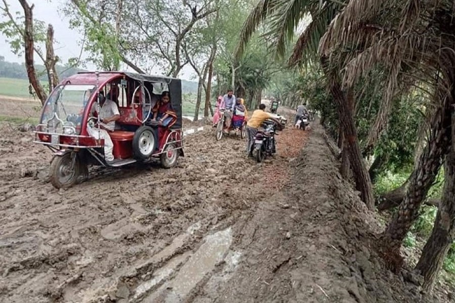 Photo shows the muddy road at Alfadanga upazila in Faridpur becomes unusable for days after one day's rain — FE Photo