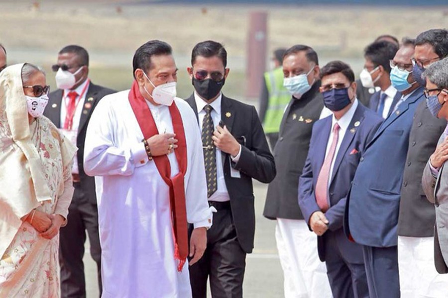 Rajapaksa receives warm welcome upon arrival in Dhaka