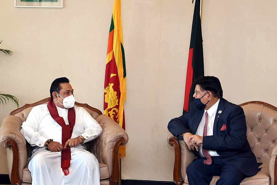 Foreign Minister A K Abdul Momen calling on Sri Lankan Prime Minister Mahinda Rajapaksa at Pan Pacific Sonargaon Hotel in Dhaka on Friday –PID Photo