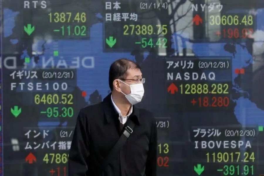 Asian shares wobble in volatile trade