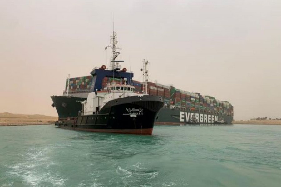 Stuck ship in Suez Canal imperils shipping worldwide