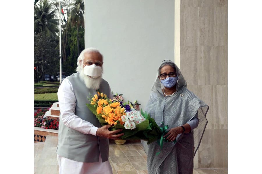 Indian Prime Minister Narendra Modi is being received by Prime Minister Sheikh Hasina at her office