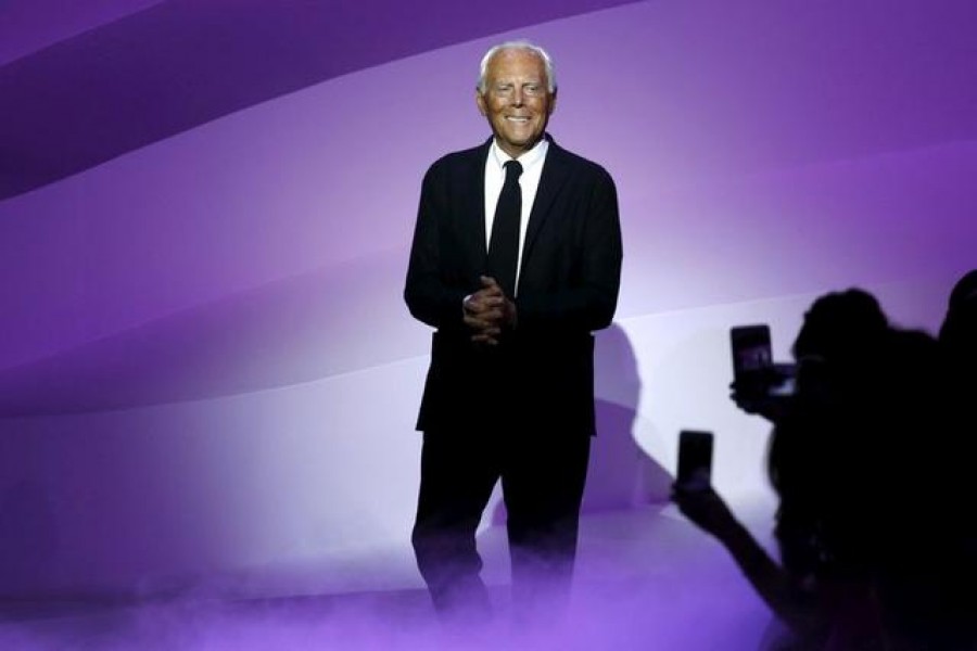 Italian designer Giorgio Armani appears at the end of his Haute Couture Spring/Summer 2016 fashion show for Giorgio Armani Prive in Paris, France, January 26, 2016. REUTERS/Benoit Tessier/File Photo