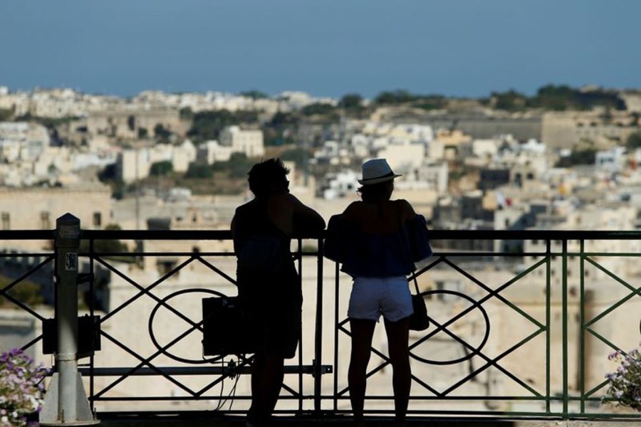 Tourists at Upper Barrakka Gardens admire the view of Grand Harbour in Valletta, Malta on July 31, 2017 — Reuters/Files