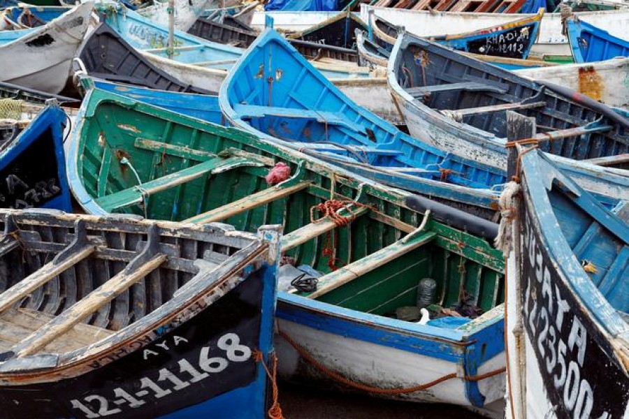 Boats used by migrants to reach the Canary Islands coasts, are seen piled up at Arinaga port, in Aguimes, on the island of Gran Canaria, Spain November 13, 2020. REUTERS/Borja Suarez/File Photo