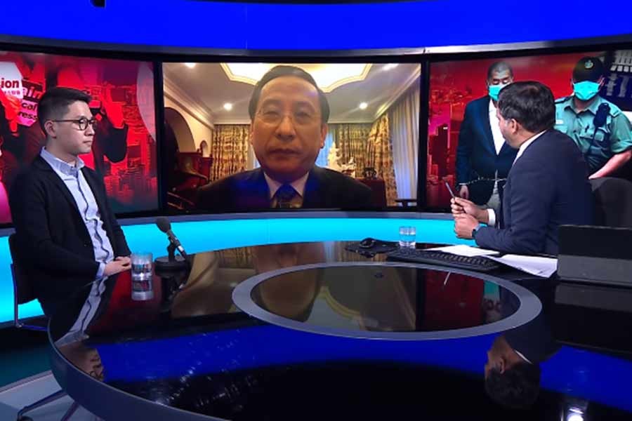 Chinese scholar Victor Gao (centre) was invited to the BBC's Newsnight to debate Hong Kong politician Nathan Law (left) on Saturday. The photo was captured from BBC News YouTube channel.