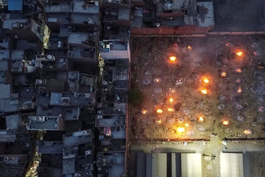 A mass cremation of victims who died due to the coronavirus disease (Covid-19), is seen at a crematorium ground in New Delhi, India on April 22, 2021. Picture taken with a drone — Reuters