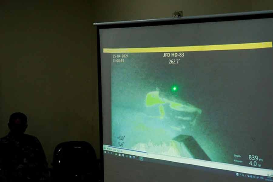 The military personnel displaying a video showing what is believed to be the sunken Indonesian Navy KRI Nanggala-402 submarine during a media conference at I Gusti Ngurah Rai Airport in Indonesia on Sunday -Reuters photo