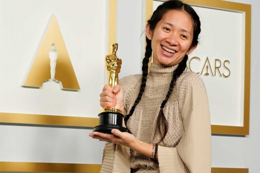 Director/Producer Chloe Zhao, winner of the award for best picture for "Nomadland," poses in the press room at the Oscars in Los Angeles, California, US,  April 25, 2021. REUTERS