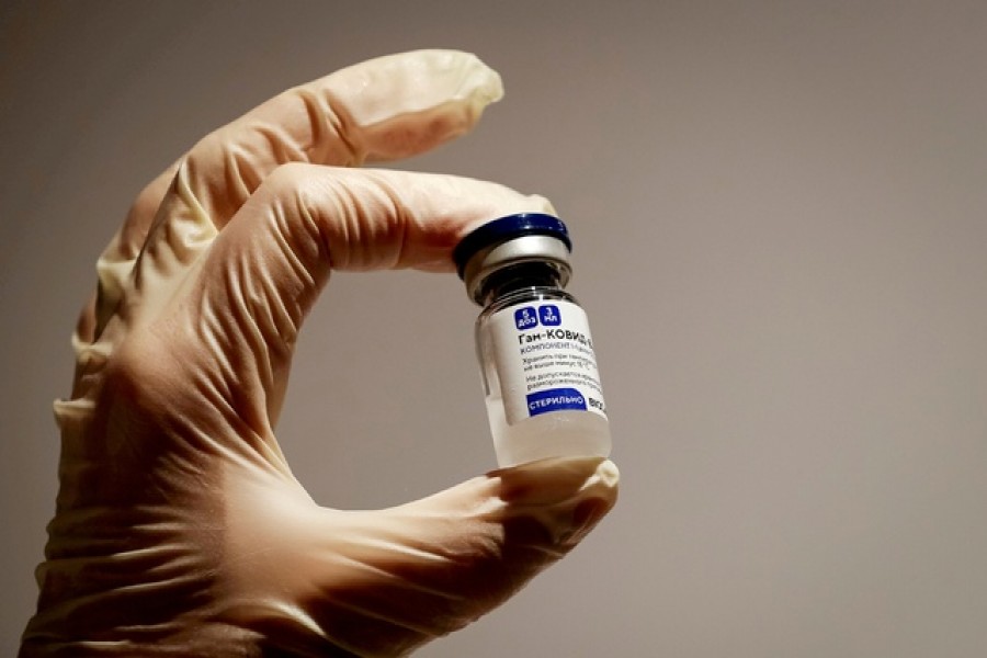 A medical specialist holds a vial of Sputnik V vaccine against the coronavirus in a department store in Moscow, Russia, on Jan 18, 2021. REUTERS