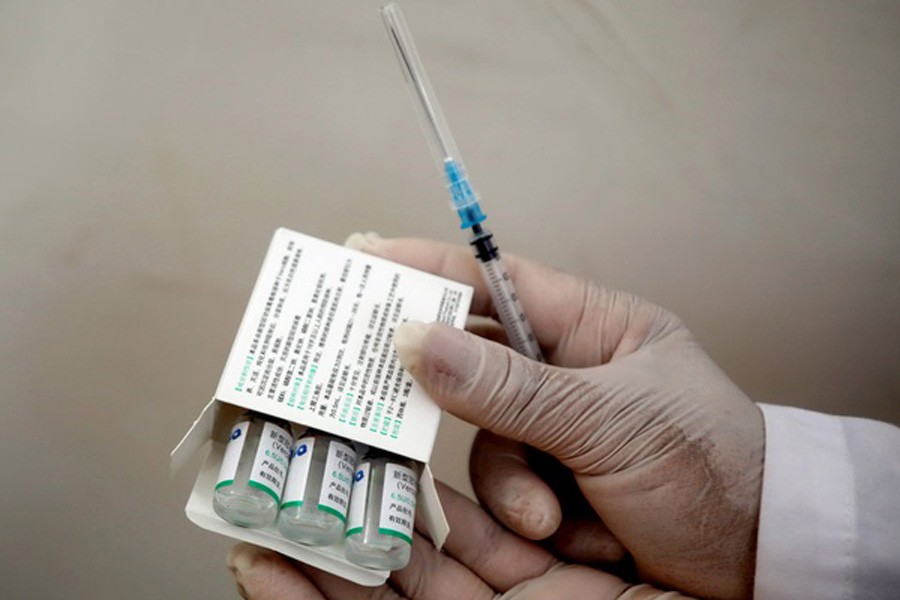 A Palestinian health worker shows vials of Sinopharm vaccine against the coronavirus disease (COVID-19) during a vaccination drive in Tubas, in the Israeli-occupied West Bank April 01, 2021. Reuters   