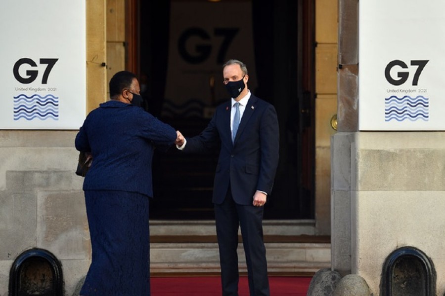 Britain's Foreign Secretary Dominic Raab welcomes South Africa's Minister of International Relations and Cooperation Naledi Pandor at the G7 foreign ministers meeting in London, Britain May 5, 2021. REUTERS