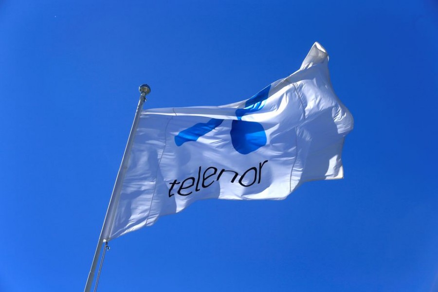 Telenor flag flutters next to the company's headquarters in Fornebu, Norway on June 1, 2017 — Reuters/Files