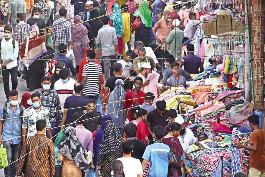 This footbridge in the New Market area of the city is crammed with people on Friday - a telltale sign that people are recklessly violating the Covid-19 health guidelines, posing a severe threat of the further virus spread — FE photo