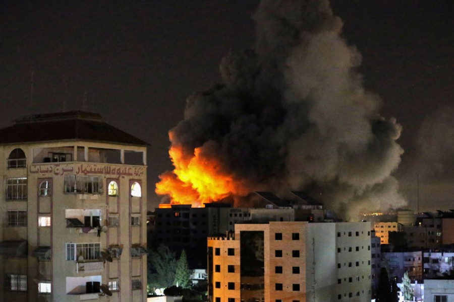 Smoke rises from a tower after it was hit by Israeli air strikes amid a flare-up of Israeli-Palestinian violence, in Gaza City on May 12, 2021 — Reuters photo