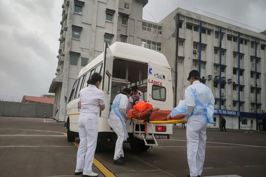 Indian navy hunts for 80 missing at sea after devastating cyclone