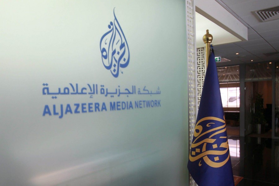 The Al Jazeera Media Network logo is seen inside its headquarters in Doha, Qatar on June 8, 2017 — Reuters/Files