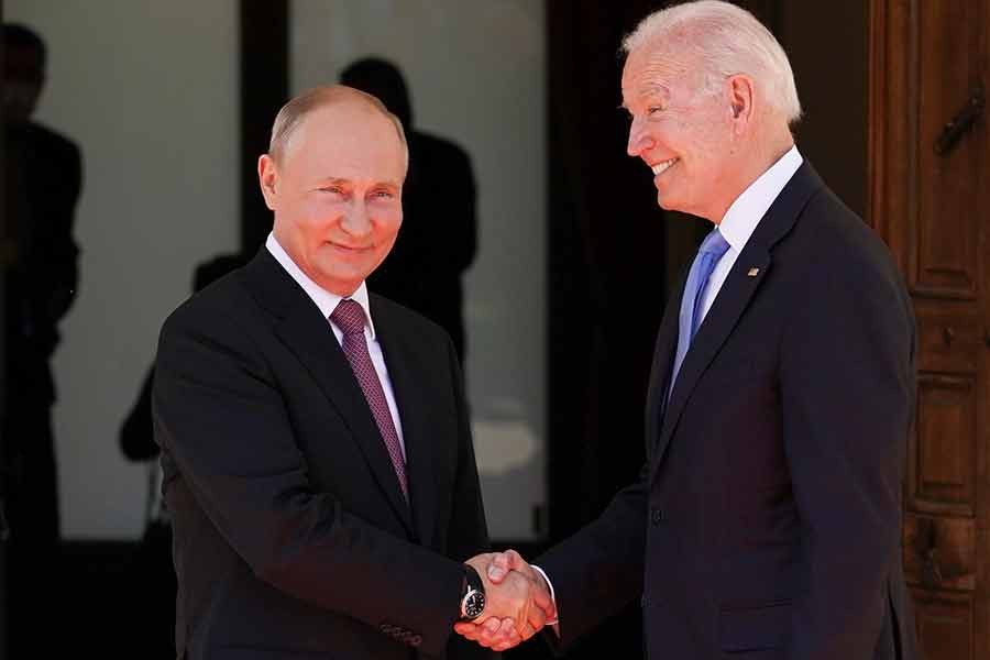 US President Joe Biden and Russia's President Vladimir Putin shaking hands as they arrive for the US-Russia summit at Villa La Grange in Geneva of Switzerland -Reuters photo