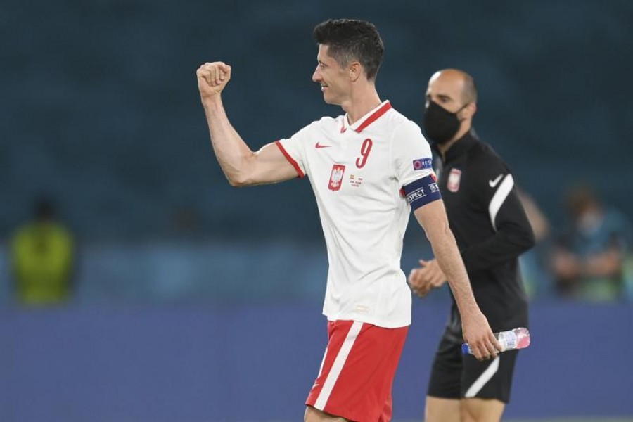 Poland's Robert Lewandowski reacts after the Euro 2020 soccer championship group E match between Spain and Poland at La Cartuja stadium in Seville, Spain, Saturday, June 19, 2021. (David Ramos/Pool via AP)