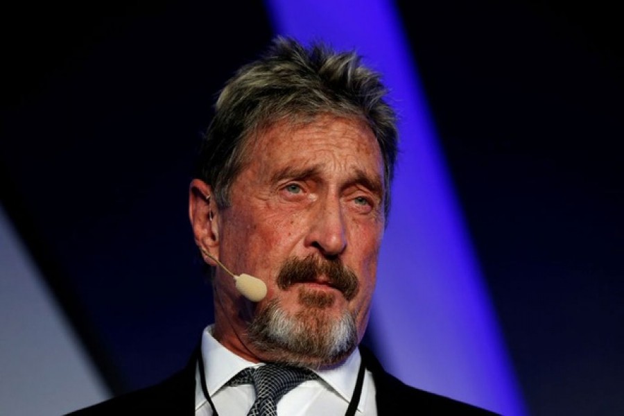 John McAfee, co-founder of McAfee Crypto Team and CEO of Luxcore and founder of McAfee Antivirus, speaks at the Malta Blockchain Summit in St Julian's, Malta November 1, 2018. REUTERS