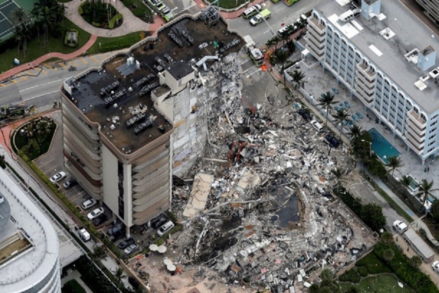 An aerial view showing a partially collapsed building in Surfside near Miami Beach, Florida, US, June 24, 2021. Reuters