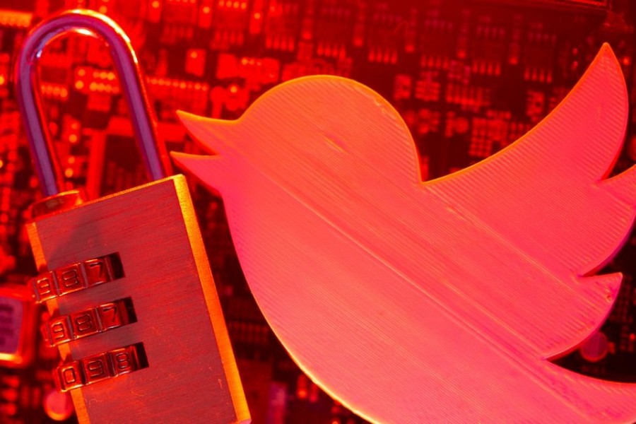 A 3D printed Twitter logo and a padlock are placed on a computer motherboard in this illustration picture taken on May 4, 2021 — Reuters/Files