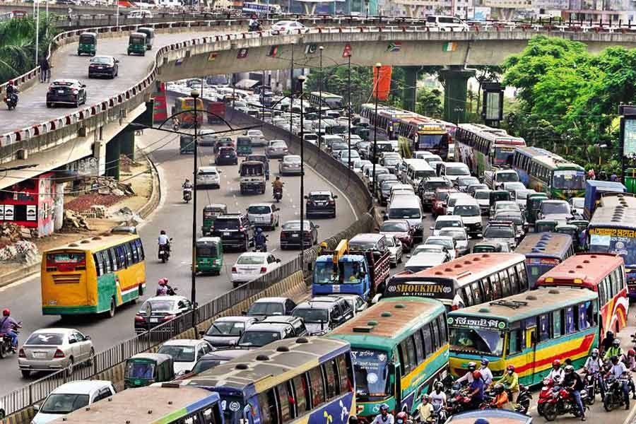 With the lockdown restrictions eased, the city witnessed heavy traffic congestions in most areas as is seen in this photo taken from Kuril flyover on the Airport Road on Thursday —FE photo by KAZ Sumon