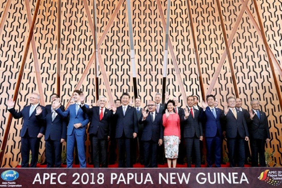 Australian Prime Minister Scott Morrison, Canada's Prime Minister Justin Trudeau, Chile's President Sebastian Pinera, Chinese President Xi Jinping, Russia's Prime Minister Dmitry Medvedev, Papua New Guinea's Prime Minister Peter O'Neill, Singaporean Prime Minister Lee Hsien Loong, Hong Kong Chief Executive Carrie Lam, Indonesian President Joko Widodo, Japan's Prime Minister Shinzo Abe Vietnam’s Prime Minister Nguyen Xuan Phuc and Malaysia Prime Minister Mahathir Mohamad pose for a family picture at the APEC Summit in Port Moresby, Papua New Guinea November 17, 2018. REUTERS