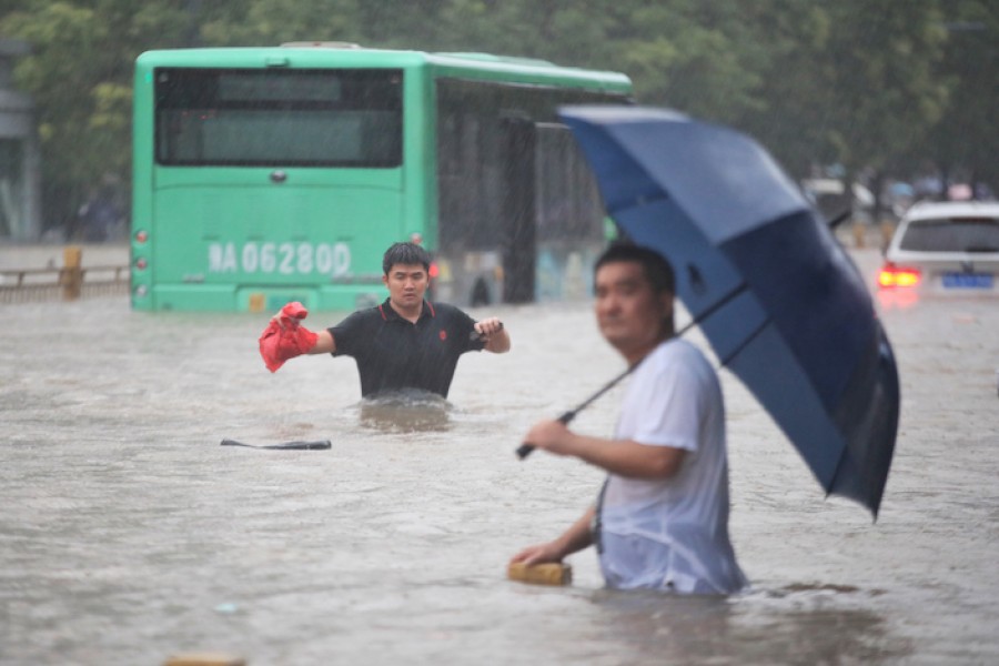 At least 12 dead as floodwaters rush into subway tunnel in China