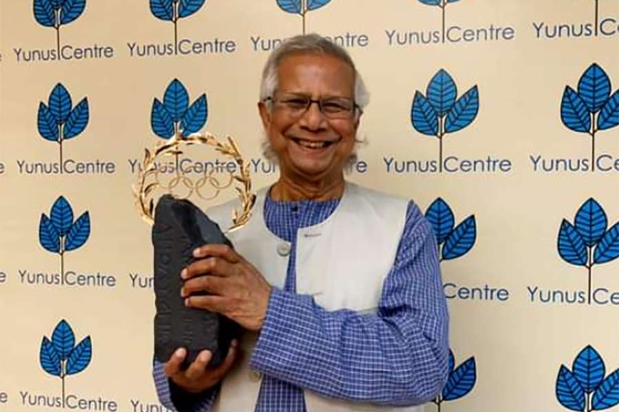 Yunus receives Olympic Laurel award, seeks vaccine patent waiver