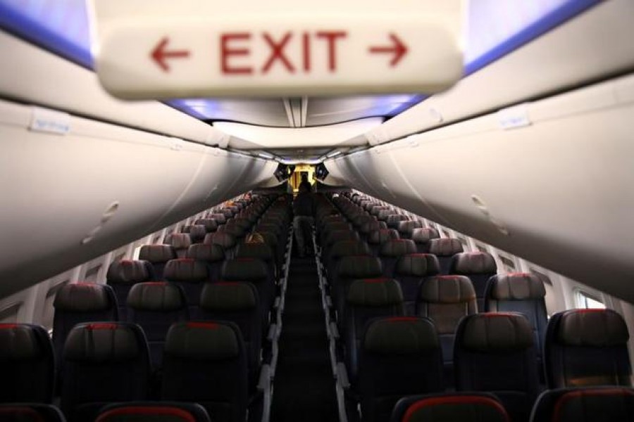 Rows of empty seats of an American Airline flight are seen, as coronavirus disease (Covid-19) disruption continues across the global industry, during a flight between Washington D.C. and Miami, in Washington, US on March 18, 2020 — Reuters/Files