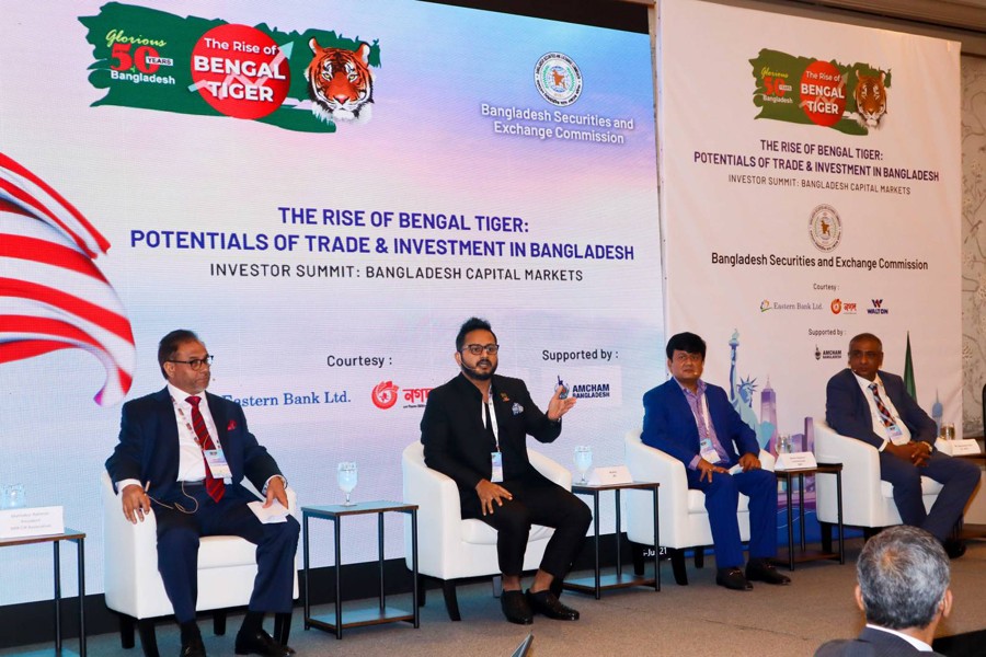 Walton Hi-Tech Industries Limited Managing Director Engineer Golam Murshed (2nd from the left) seen speaking during the first part of the roadshow organised by BSEC