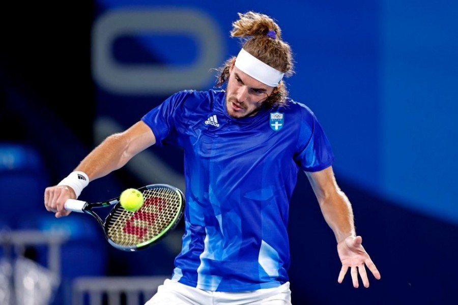 Stefanos Tsitsipas (GRE) plays Frances Tiafoe (USA) in the mens tennis first round singles during the Tokyo 2020 Olympic Summer Games at Ariake Tennis Park — USA TODAY Sports via REUTERS