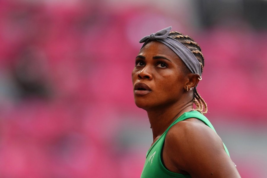 Tokyo 2020 Olympics - Athletics - Women's 100m - Round 1 - OLS - Olympic Stadium, Tokyo, Japan - July 30, 2021. Blessing Okagbare of Nigeria reacts after competing in Heat 6 REUTERS/Aleksandra Szmigiel