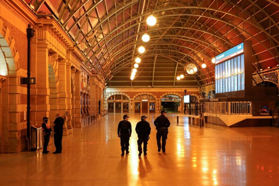 Police officers patrol through the quiet Central Station in the city centre during a lockdown to curb the spread of a coronavirus disease (Covid-19) outbreak in Sydney, Australia on August 12, 2021 — Reuters photo