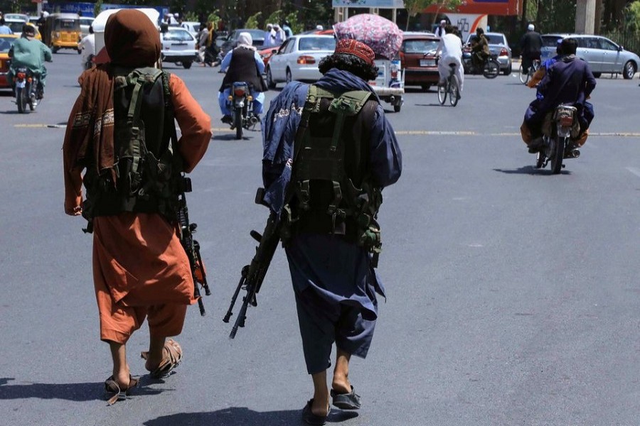 Taliban forces patrol a street in Herat, Afghanistan, August 14, 2021 — Reuters/Stringer