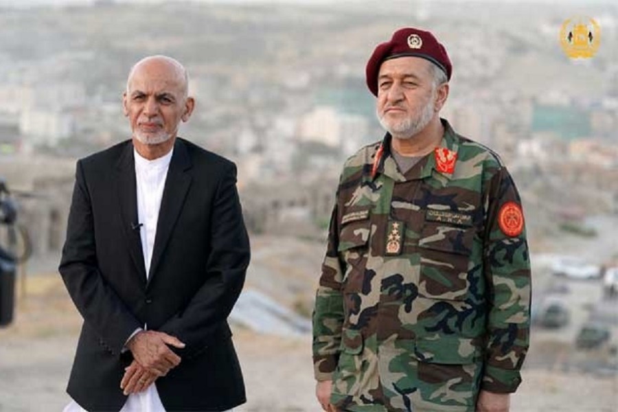 Afghanistan's President Ashraf Ghani and acting defence minister Bismillah Khan Mohammadi visit military corps in Kabul, Afghanistan August 14, 2021. Afghan Presidential Palace/Handout via REUTERS