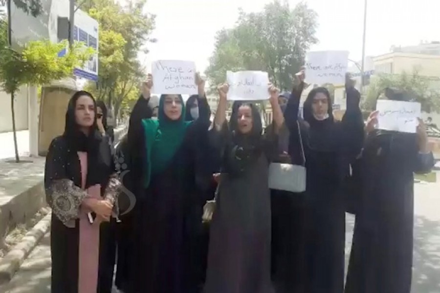 People carry Afghan flags as they take part in an anti-Taliban protest in Jalalabad, Afghanistan, August 18, 2021 in this screen grab taken from a video — Pajhwok Afghan News via Reuters