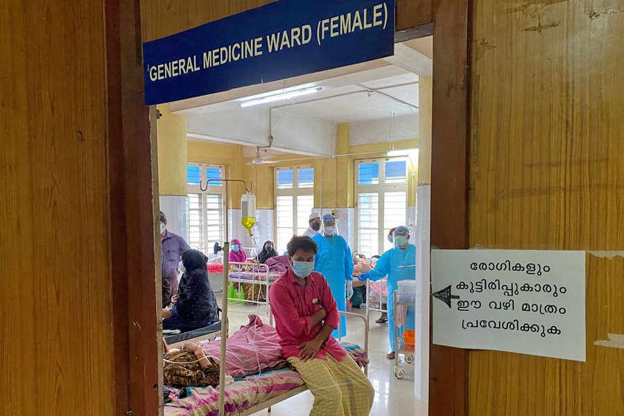 A man looks out from a coronavirus disease (COVID-19) ward in the Government Medical College Hospital in Manjeri, in the Malappuram district of the southern state of Kerala, India on August 18, 2021 — Reuters/Files