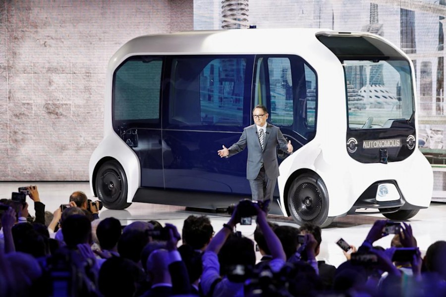 Toyota Motor Corporation President Akio Toyoda, arrives in their e-Palette autonomous concept vehicle to give his presentation at the Tokyo Motor Show, in Tokyo - Reuters photo