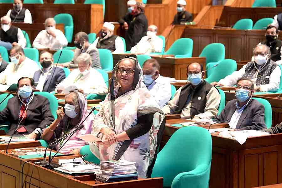 Prime Minister Sheikh Hasina taking part in a discussion on an obituary reference in the parliament on Wednesday -PID Photo