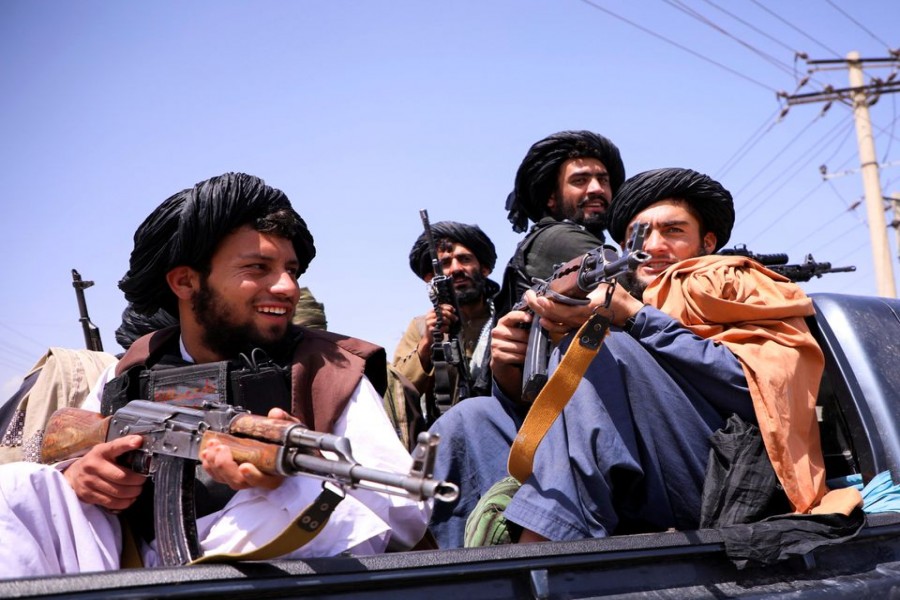 Taliban forces patrol in front of Hamid Karzai International Airport in Kabul, Afghanistan, September 2, 2021. REUTERS/Stringer/File Photo